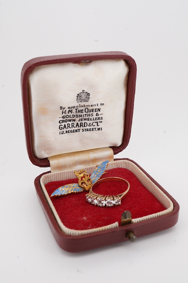 A 1960's Garrard & Co 9ct gold and two colour enamel sweethearts brooch, 36mm, with Asprey box, together with a 9ct gold and five stone simulated diamond set half hoop ring.